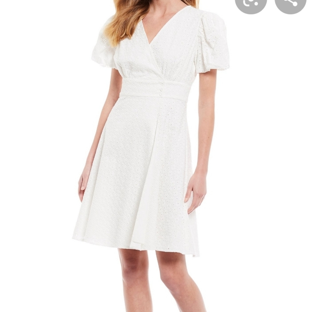 Summer off white eyelet wrap dress by A Loves A  in a size Medium
